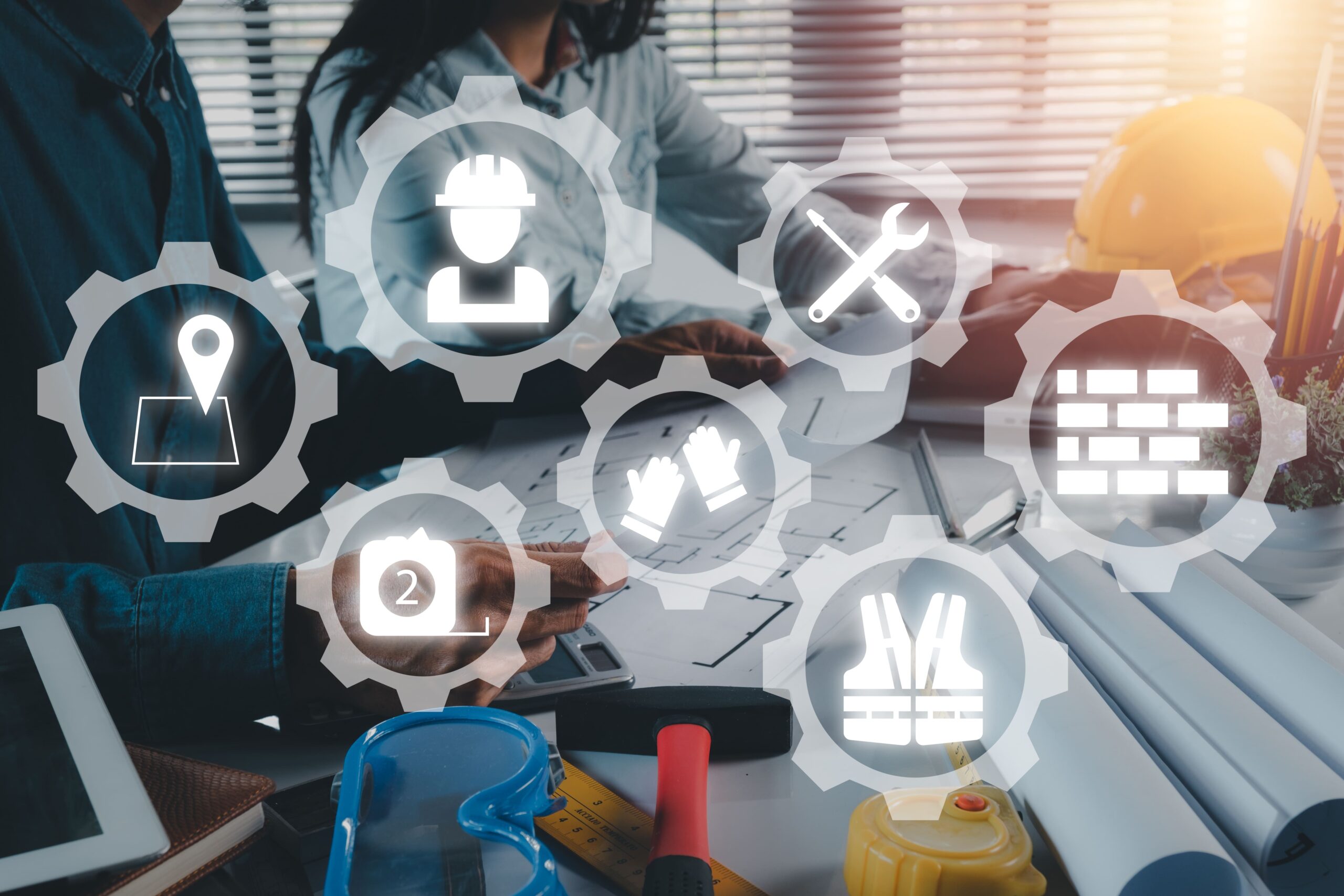 construction-team-worker-working-office-with-engineering-tools-with-vr-screen-building-icon-blueprint-building-model-construction-concept (1)
